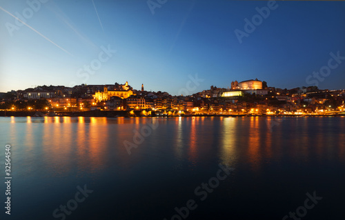 Porto at night from the Duoro river photo