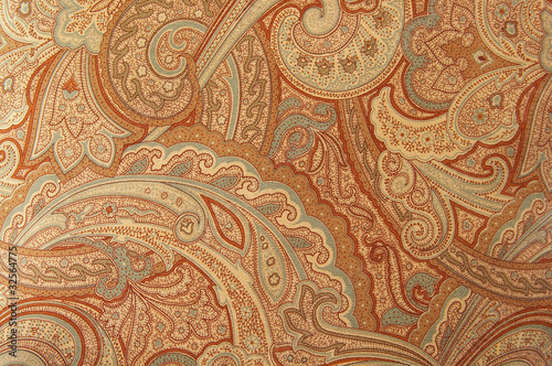 A brown paisley 70s style design pattern photo