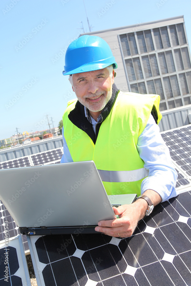 Engineer checking photovoltaic installation
