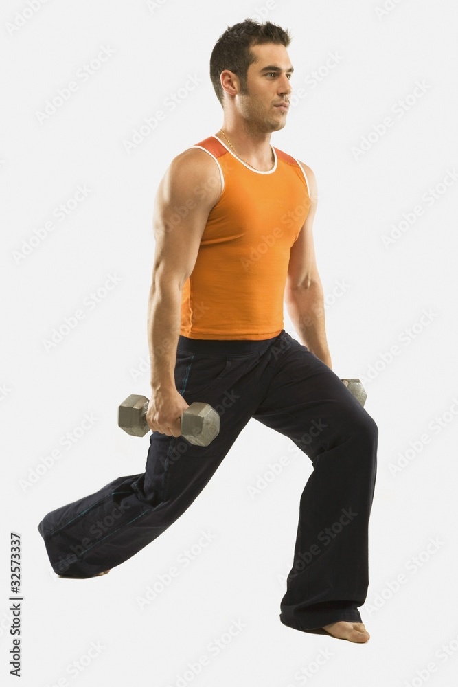 A Man Exercising With Free Weights A Man Exercising With Free Weights