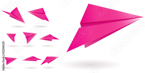 pink paper planes isolated on white background