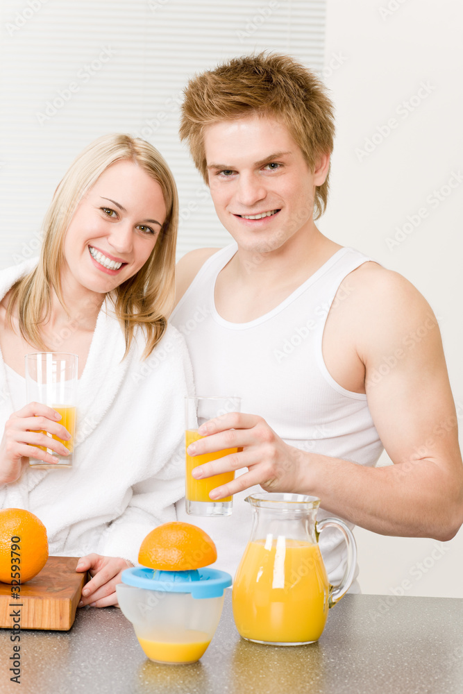 Breakfast happy couple make orange juice morning Breakfast happy couple make orange juice morning