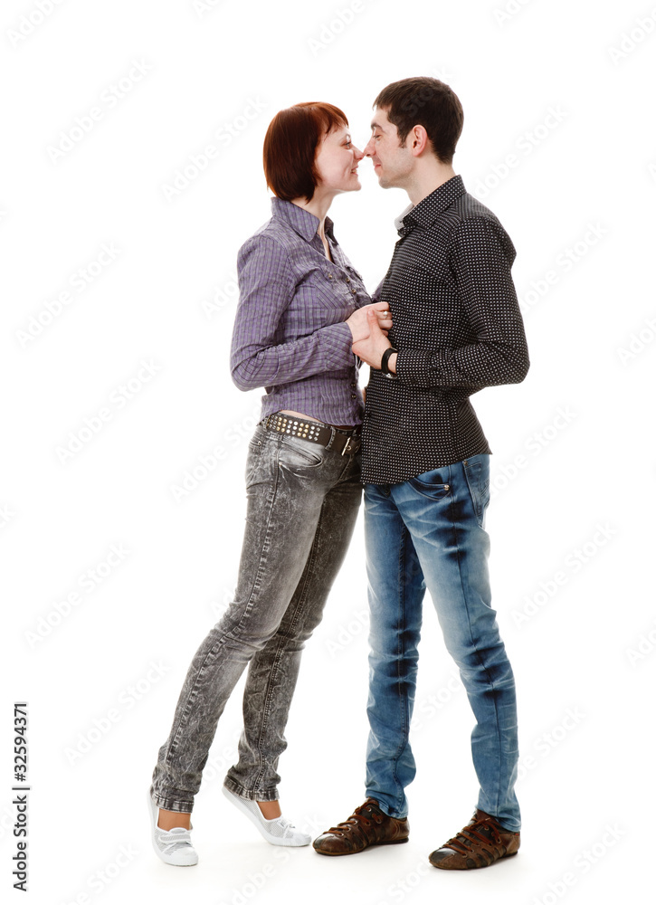 Young woman and man standing on the floor and look at each other Young woman and man standing on the floor and look at each other