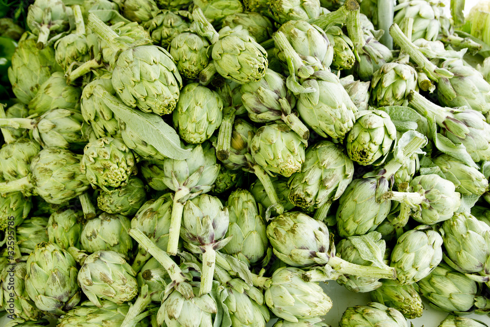 artichokes vegetables in a market mound artichokes vegetables in a market mound