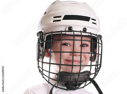 Boy in hockey helmet © paleka