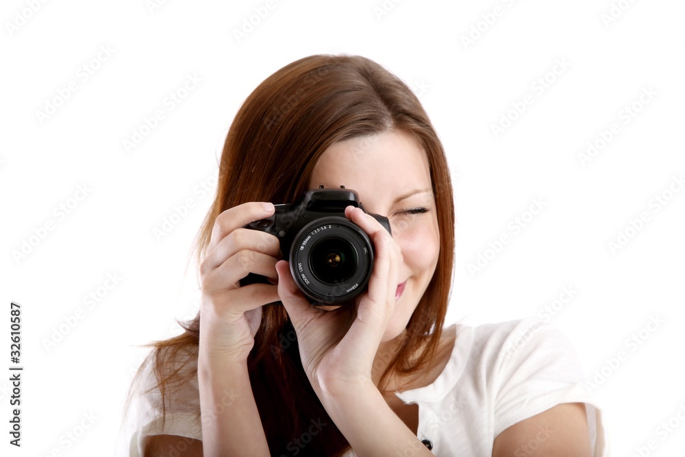 young woman with single-lens reflex camera (white background) young woman with single-lens reflex camera (white background)