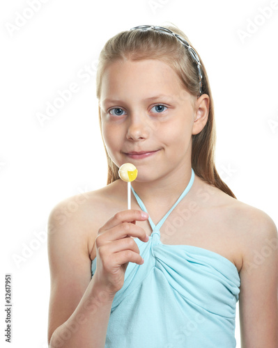 Cheerful little girl with lollipop