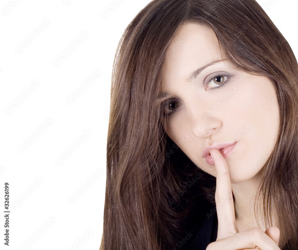 bright picture of young woman with finger on lips over white bright picture of young woman with finger on lips over white