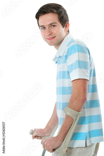 Junge mit Krücken photo