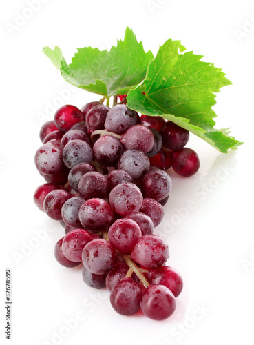 Pink grape cluster isolated on white