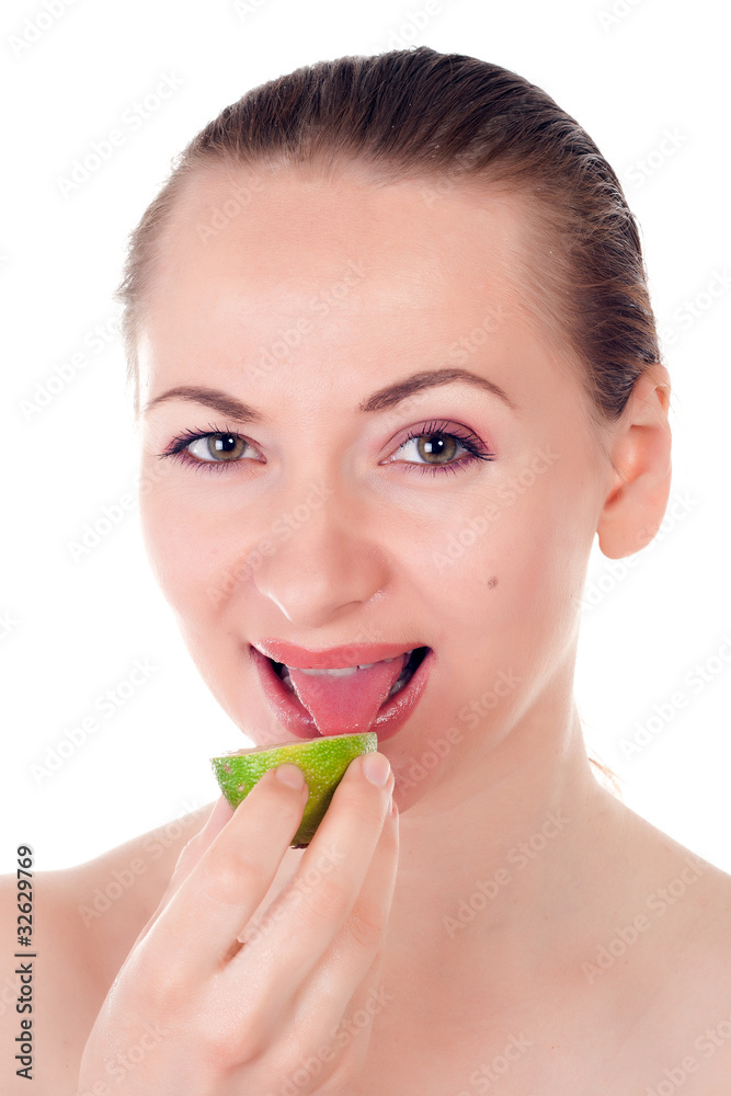 Happy pretty model posing with half of lime Happy pretty model posing with half of lime