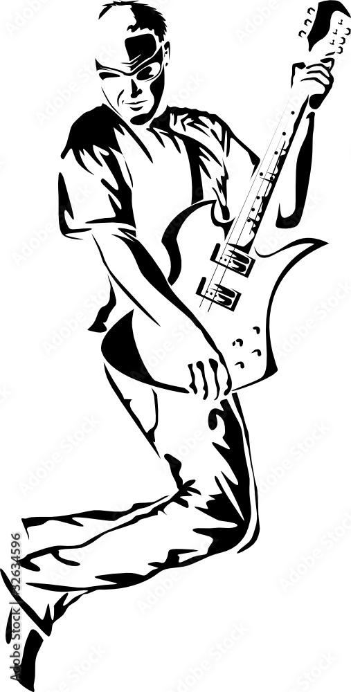 Fototapeta premium Portrait of the young man with a guitar