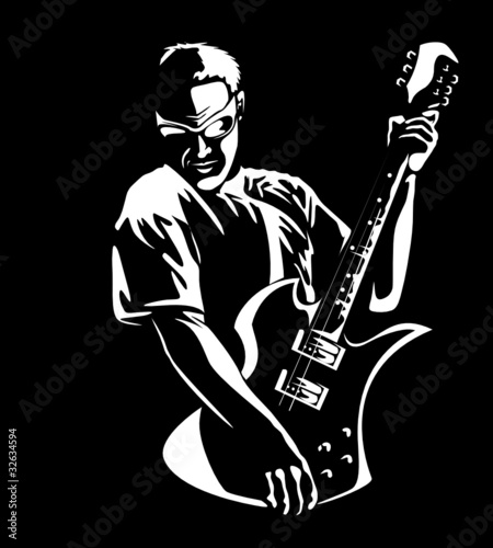 Portrait of the young man with a guitar