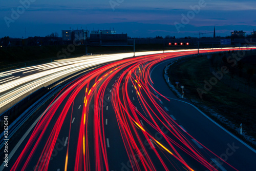 Cars on highway at night