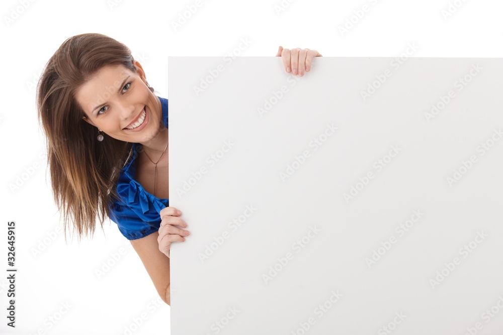Cheerful woman in studio with blank sheet Cheerful woman in studio with blank sheet