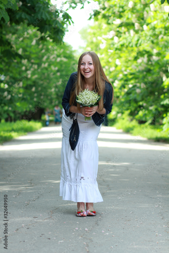 beautiful blond with a bouquet of lilies of the valley beautiful blond with a bouquet of lilies of the valley