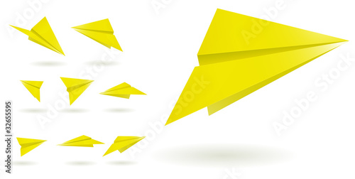 yellow paper planes isolated on white background
