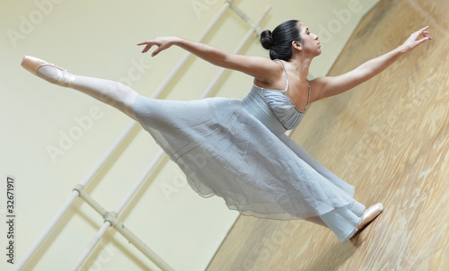 Ballerina in the dance studio photo