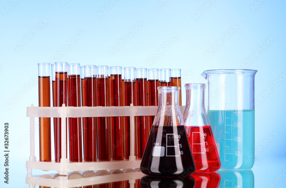 Test tubes closeup on blue background Test tubes closeup on blue background