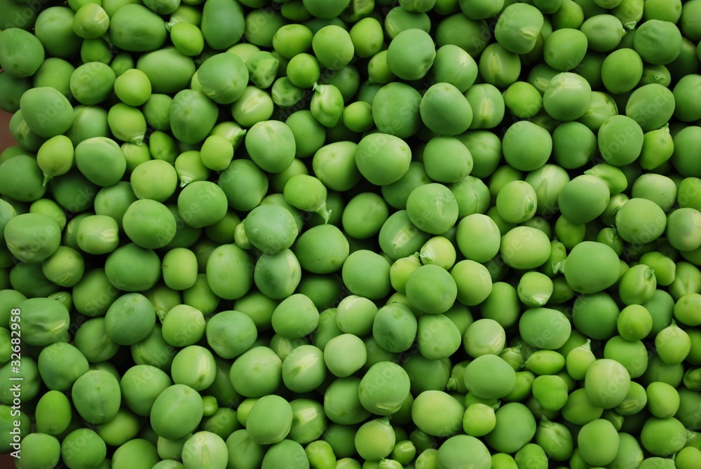 Shelled fresh ripe sweet green peas background, horizontal Shelled fresh ripe sweet green peas background, horizontal