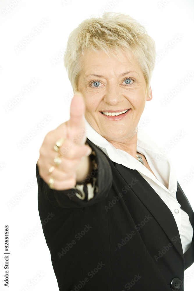 Nice elderly businesswoman posing on white background Nice elderly businesswoman posing on white background