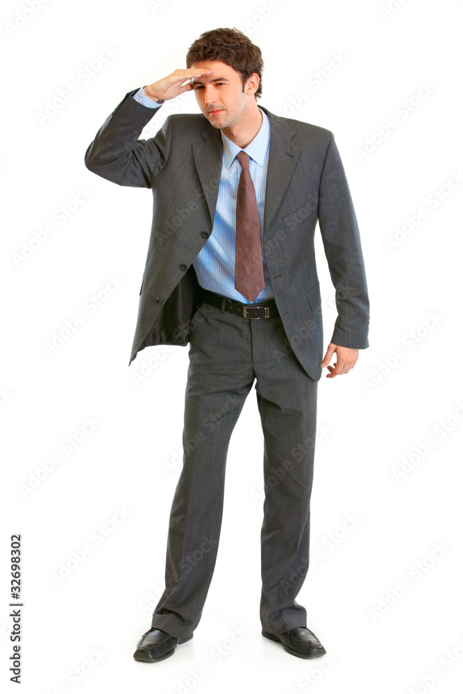 Businessman holding hand at forehead and looking in futur Businessman holding hand at forehead and looking in futur
