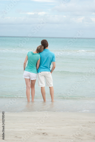 Happy couple on the beach © Bandido Images
