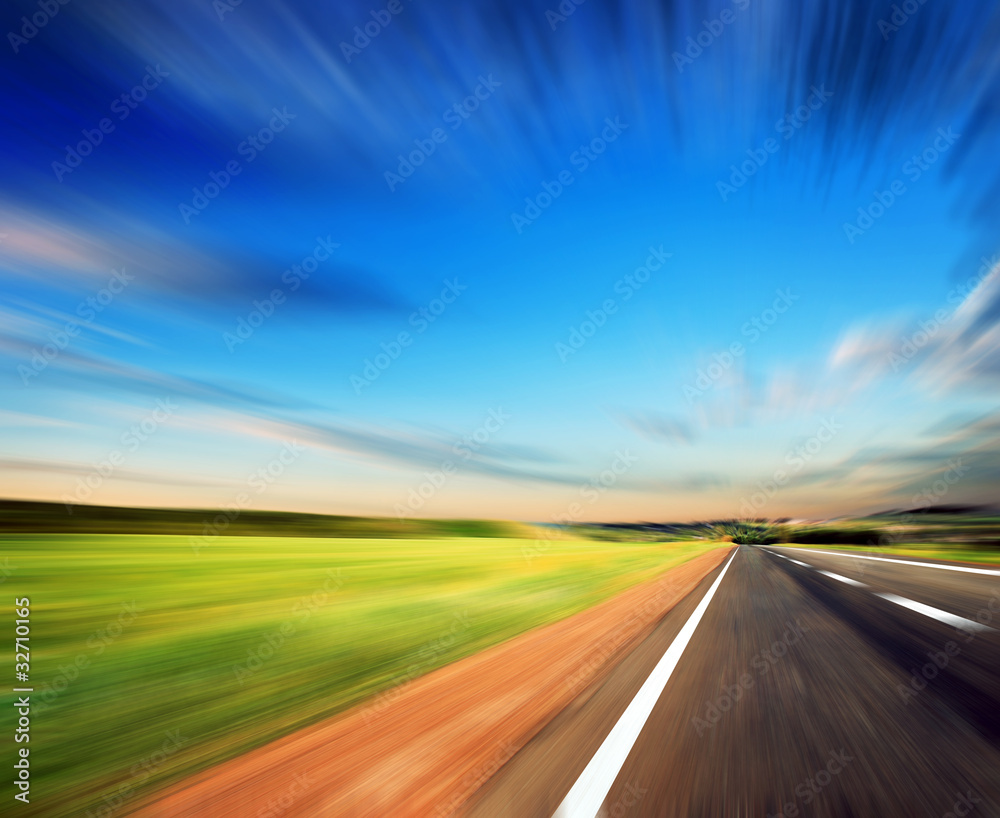 Naklejka premium blured road and blue sky