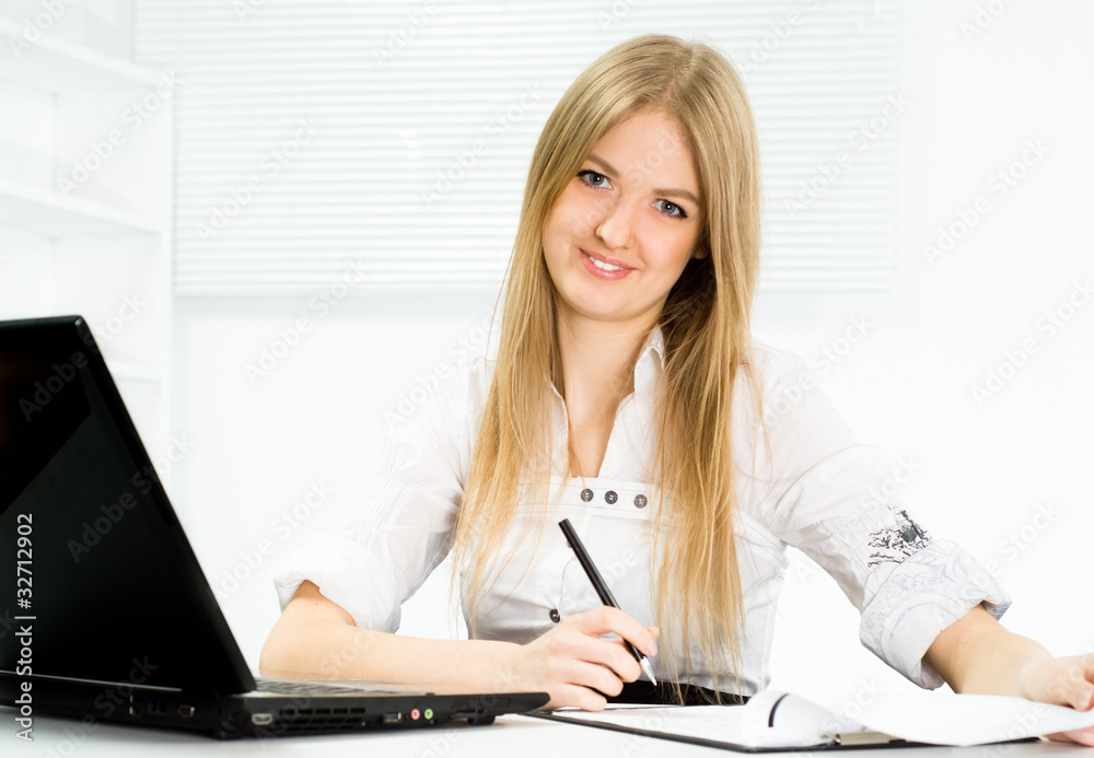 beautiful girl working in the office beautiful girl working in the office