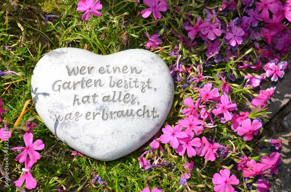 Stein mit Spruch im Garten StockFoto Adobe Stock