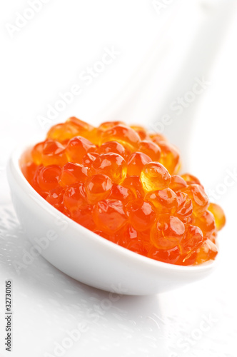 Salmon caviar in spoon
