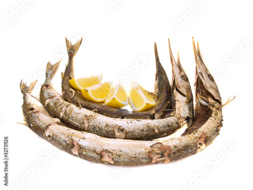 Garfish (Belone belone) baked, isolated over white photo