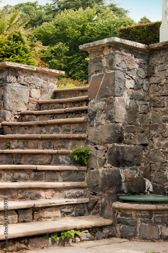 A natural stone stairway in a garden.