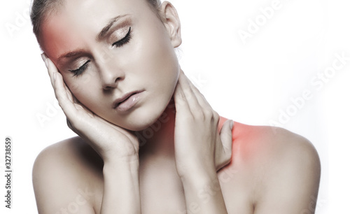 woman with headache on white background