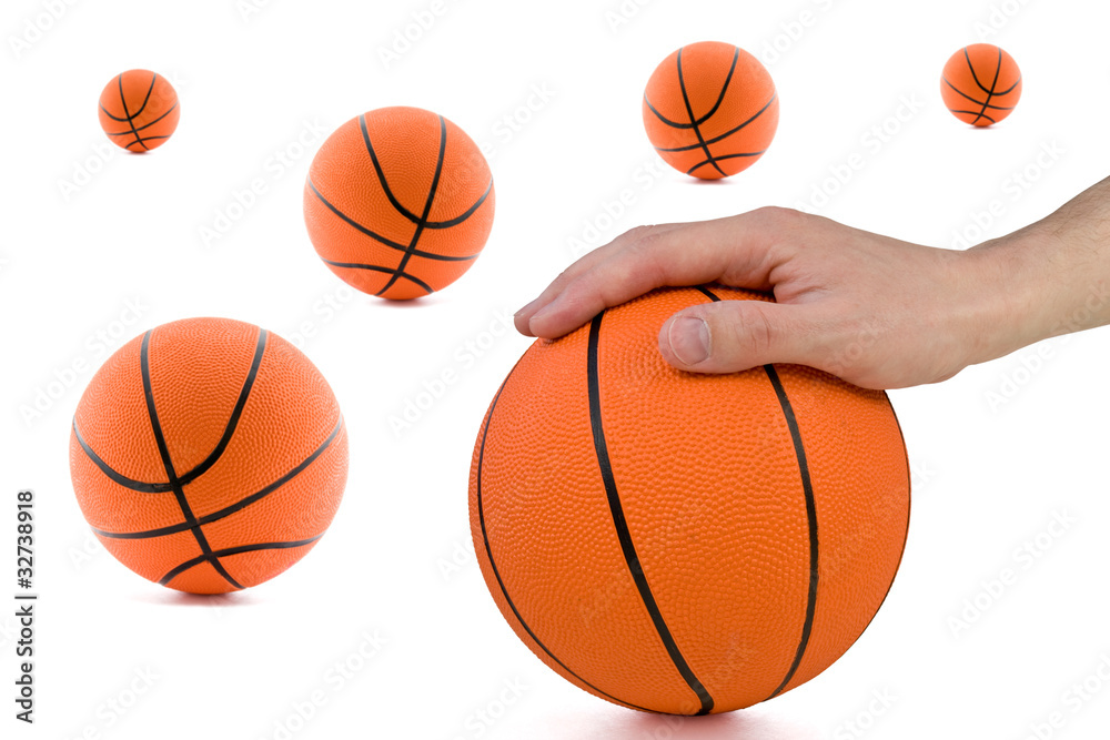 basketball abstract. player hand and many orange balls.