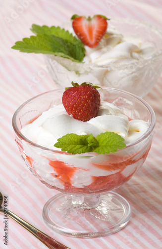 dessert with cream and strawberries