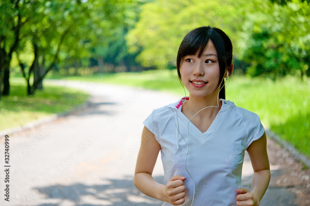 beautiful asian woman jogging in the park beautiful asian woman jogging in the park