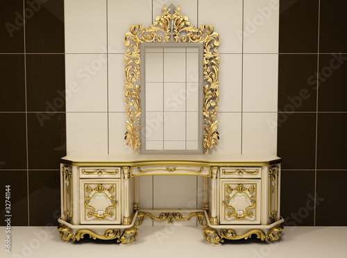 Baroque gold mirror with royal chest photo