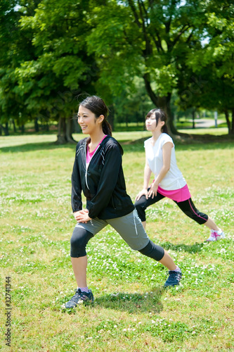 beautiful asian women exercising in the park