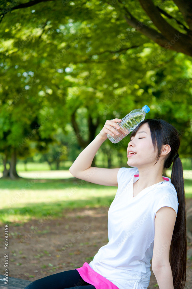 beautiful asian woman relaxing in the park beautiful asian woman relaxing in the park