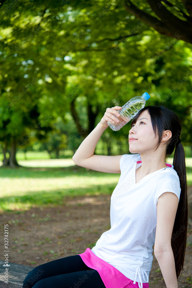 beautiful asian woman relaxing in the park beautiful asian woman relaxing in the park