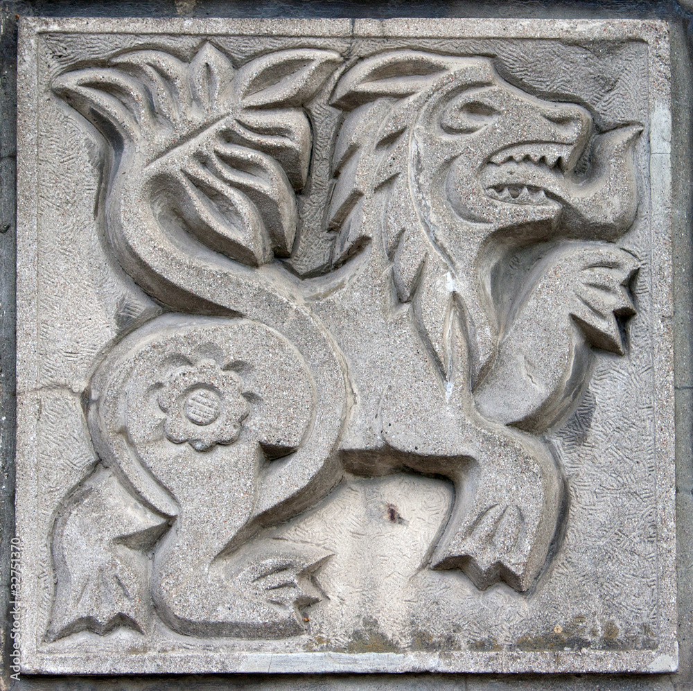 old bas-relief of fairytale lion