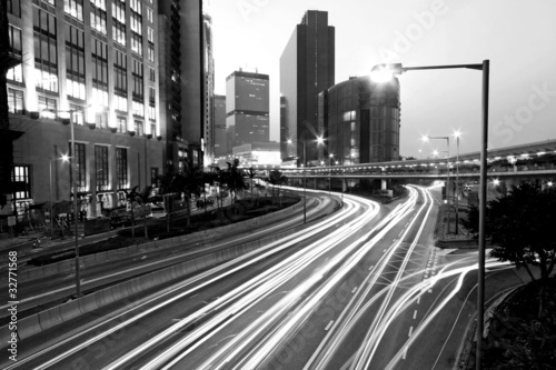 Traffic in Hong Kong at night in black and white