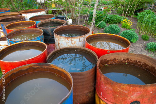 Water barrel in a garden © aigarsr