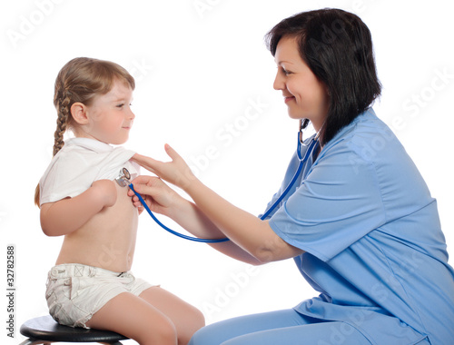 doctor listens by stethoscope girl