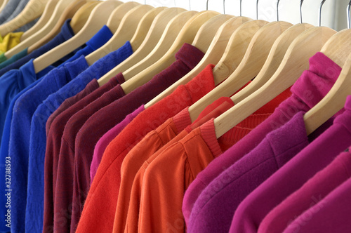 A line colorful clothing on hanger in a row