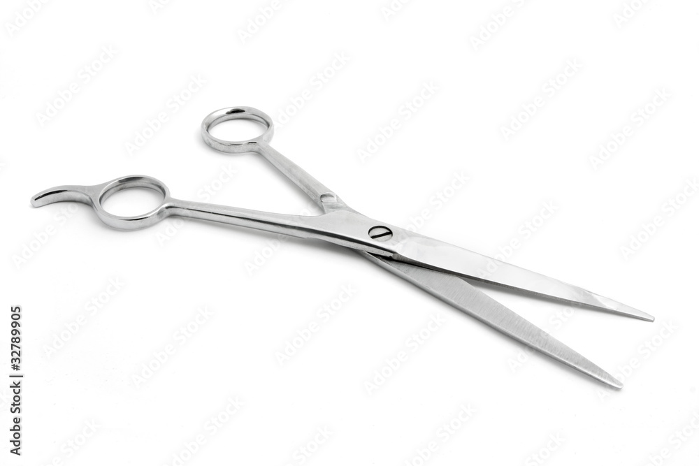 Open pair of scissors isolated over white Open pair of scissors isolated over white