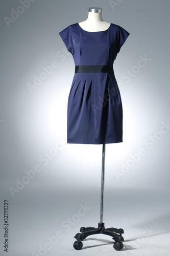Woman blue cloth on mannequin on light background