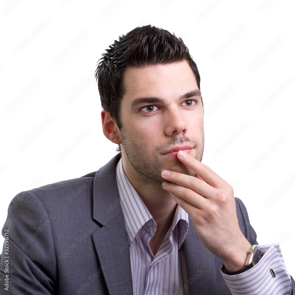 Young business man thinking hard Young business man thinking hard
