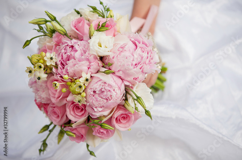 Bride with bouquet, closeup © popovich22